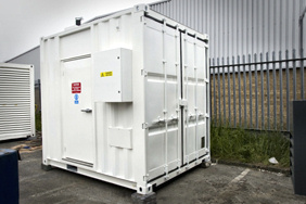 cummins c150 canopied generator in small container