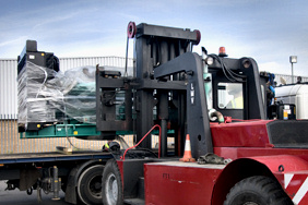 cummins c500 generator loading onto a lorry